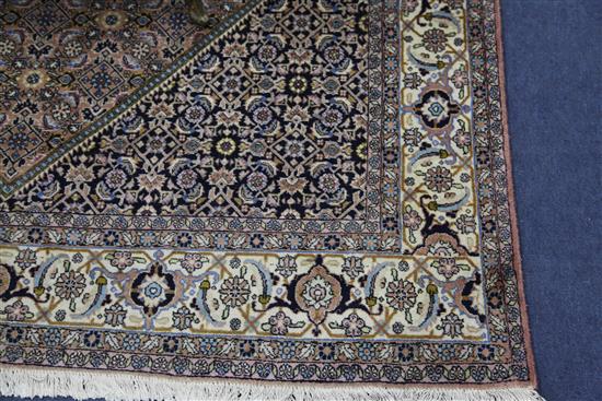 A modern Persian rug, 8ft by 5ft 7in.
